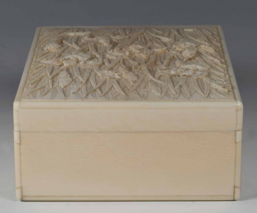 A FINELY CARVED JAPANESE IVORY LIDDED BOX BY KIYOCHIKA View III