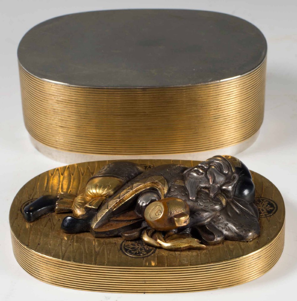 HUMEROUS JAPANESE MIXED METAL LIDDED BOX DEPICTING DAIKOKU View III