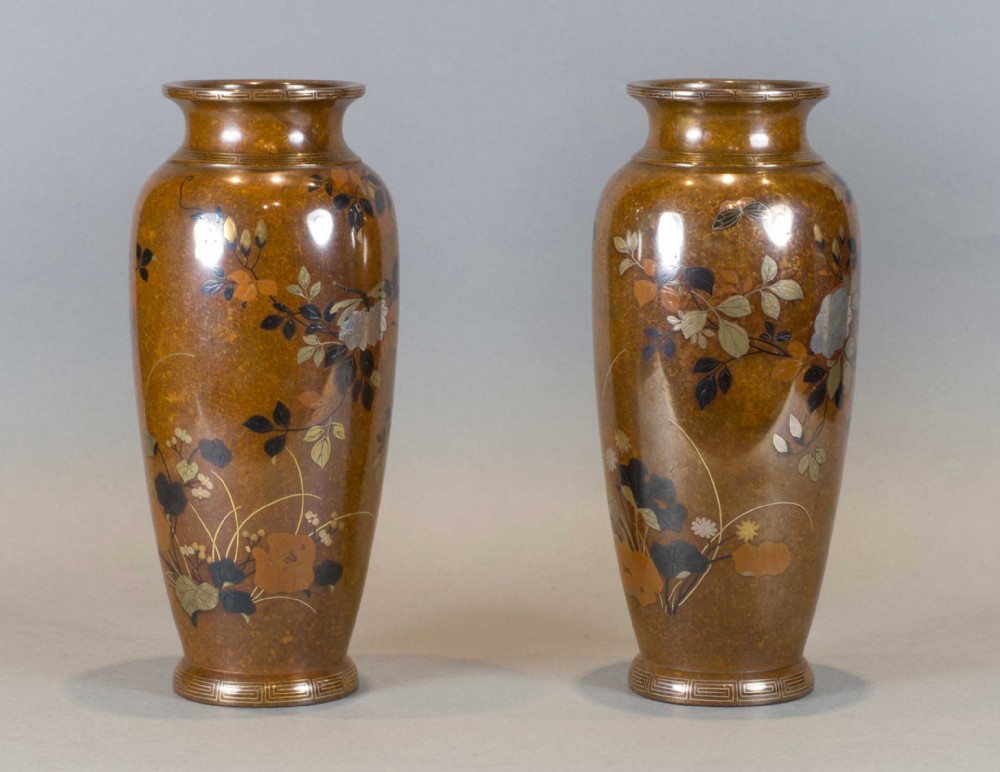 A DECORATIVE PAIR OF JAPANESE INLAID MIXED METAL VASES BY NOGAWA COMPANY View II