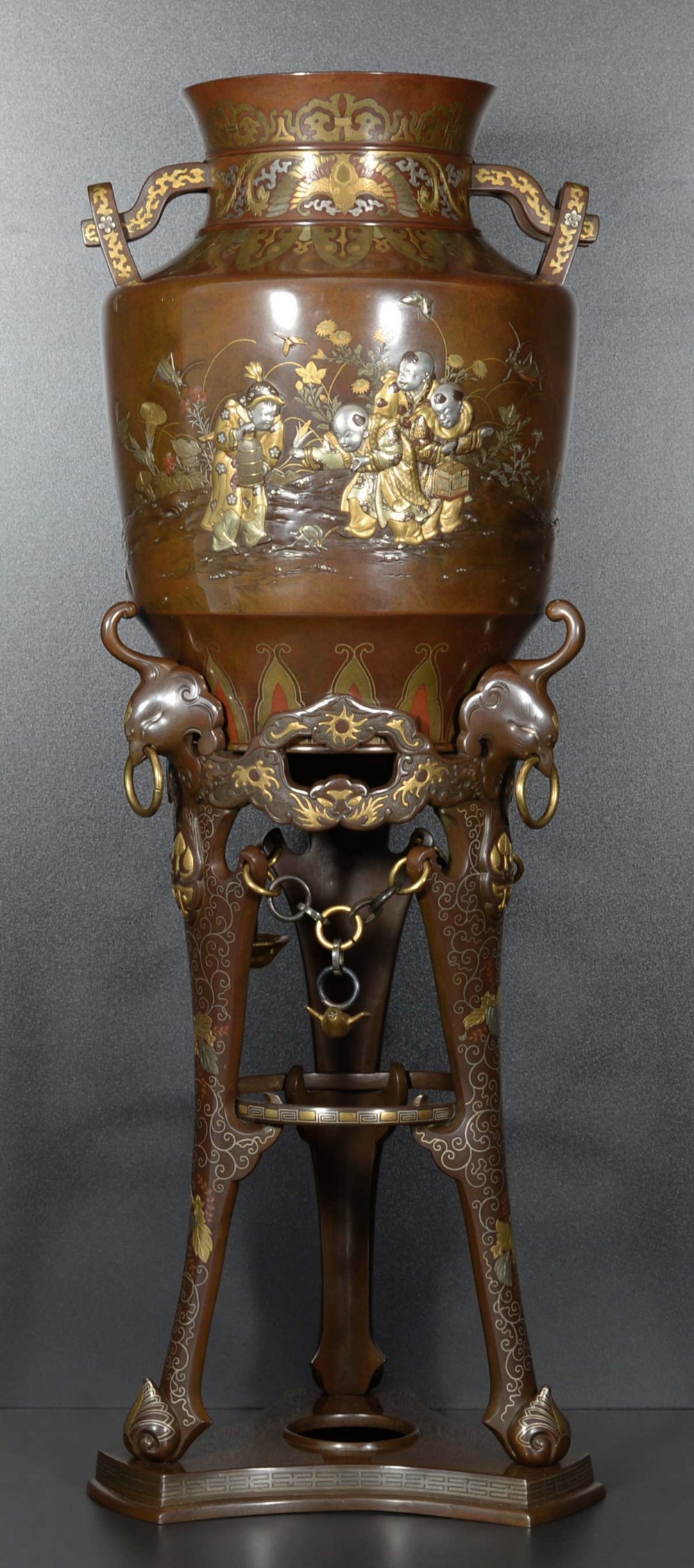 a large japanese mixed metal vase on stand depicting boys catching crickets - CATEGORY: ANTIQUE VASES - DATED 1890