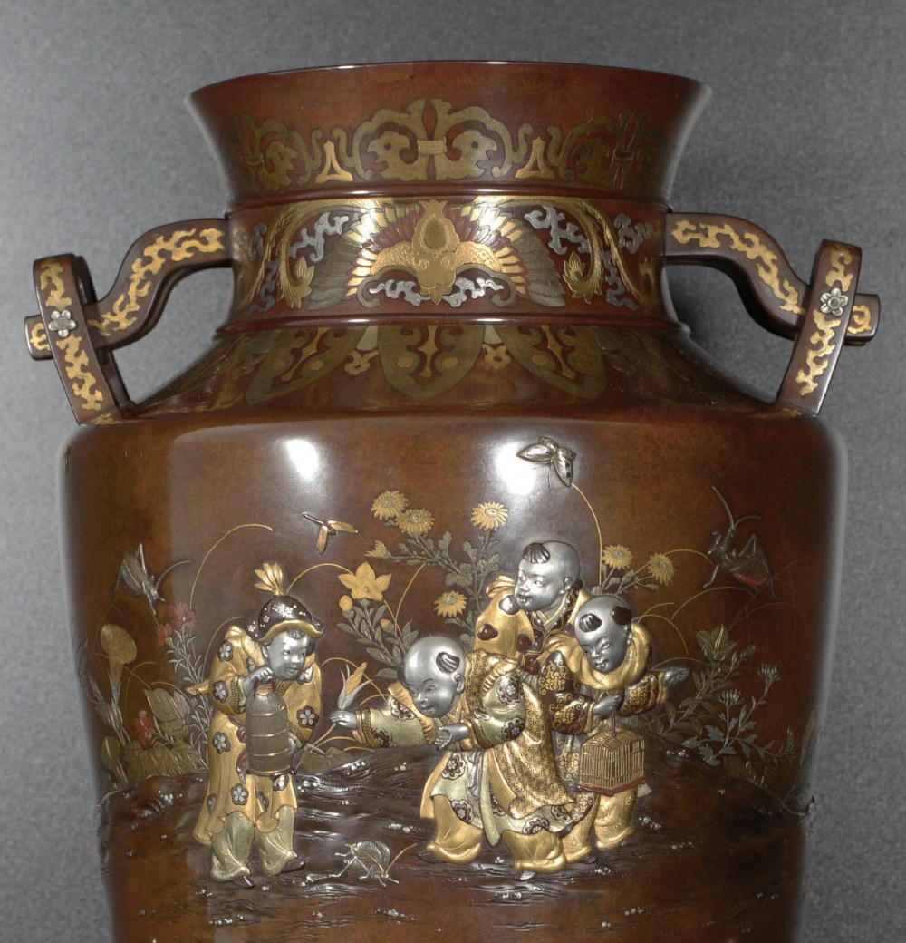 A LARGE JAPANESE MIXED METAL VASE ON STAND DEPICTING BOYS CATCHING CRICKETS View V