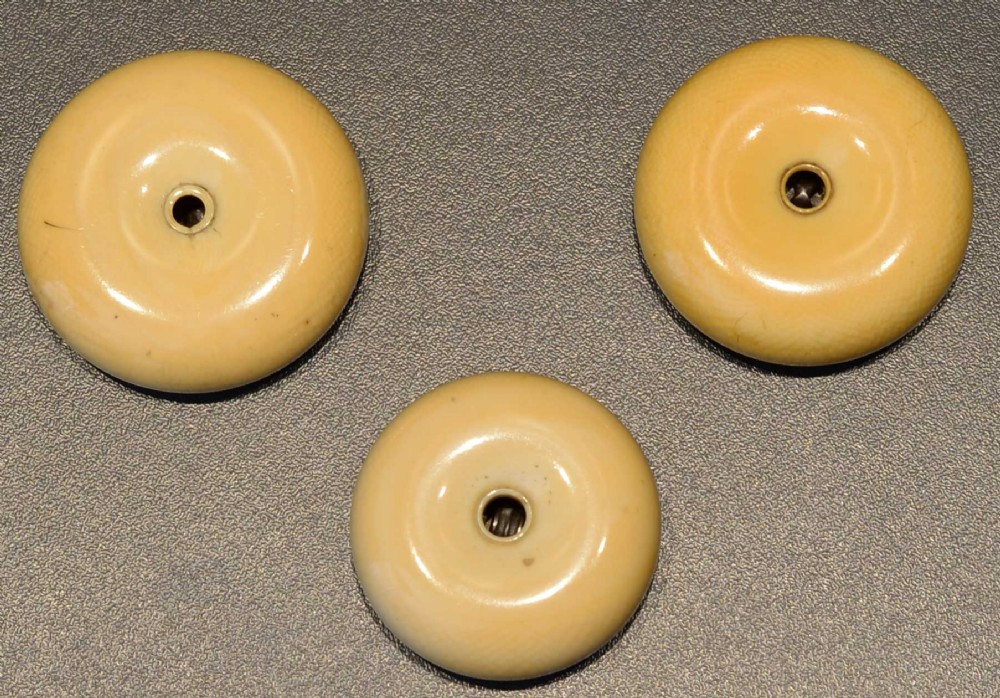 GROUP OF THREE JAPANESE KAGAMIBUTA IVORY AND MIXED METAL NETSUKES View VI