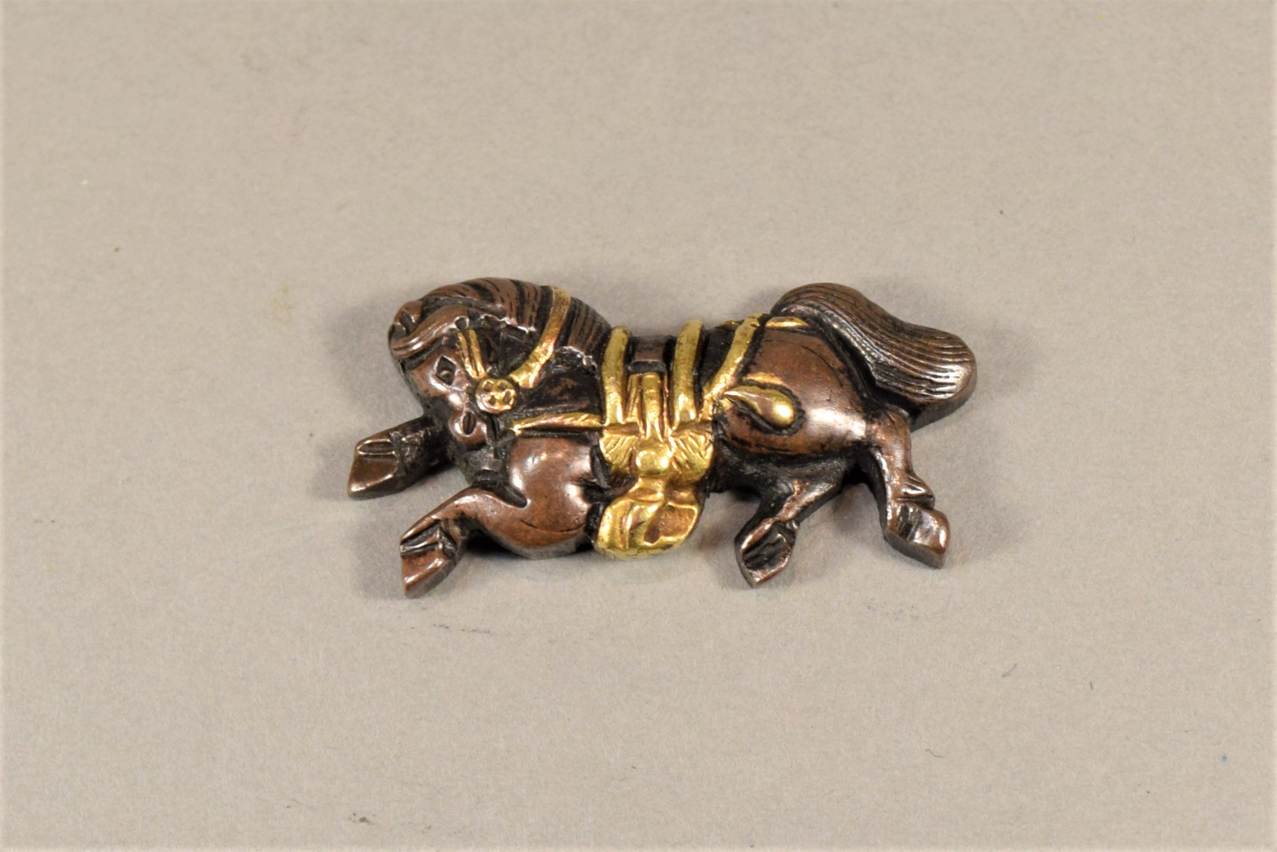 NICE QUALITY PAIR OF JAPANESE MIXED METAL MENUKI - HORSES View II
