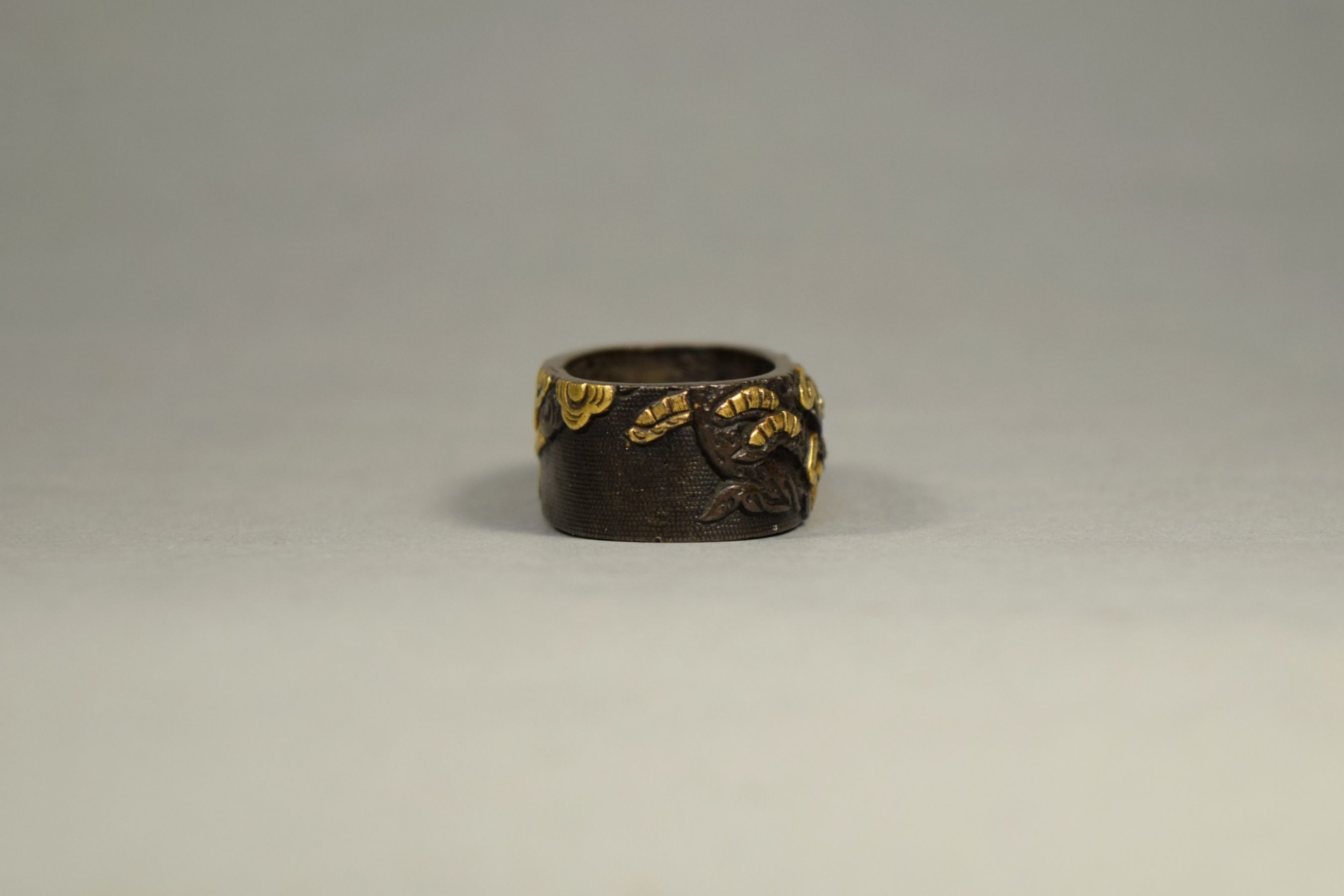 A NICE GROUP OF JAPANESE EDO PERIOD MIXED METAL FUCHI (SWORD FITTINGS) View XVI