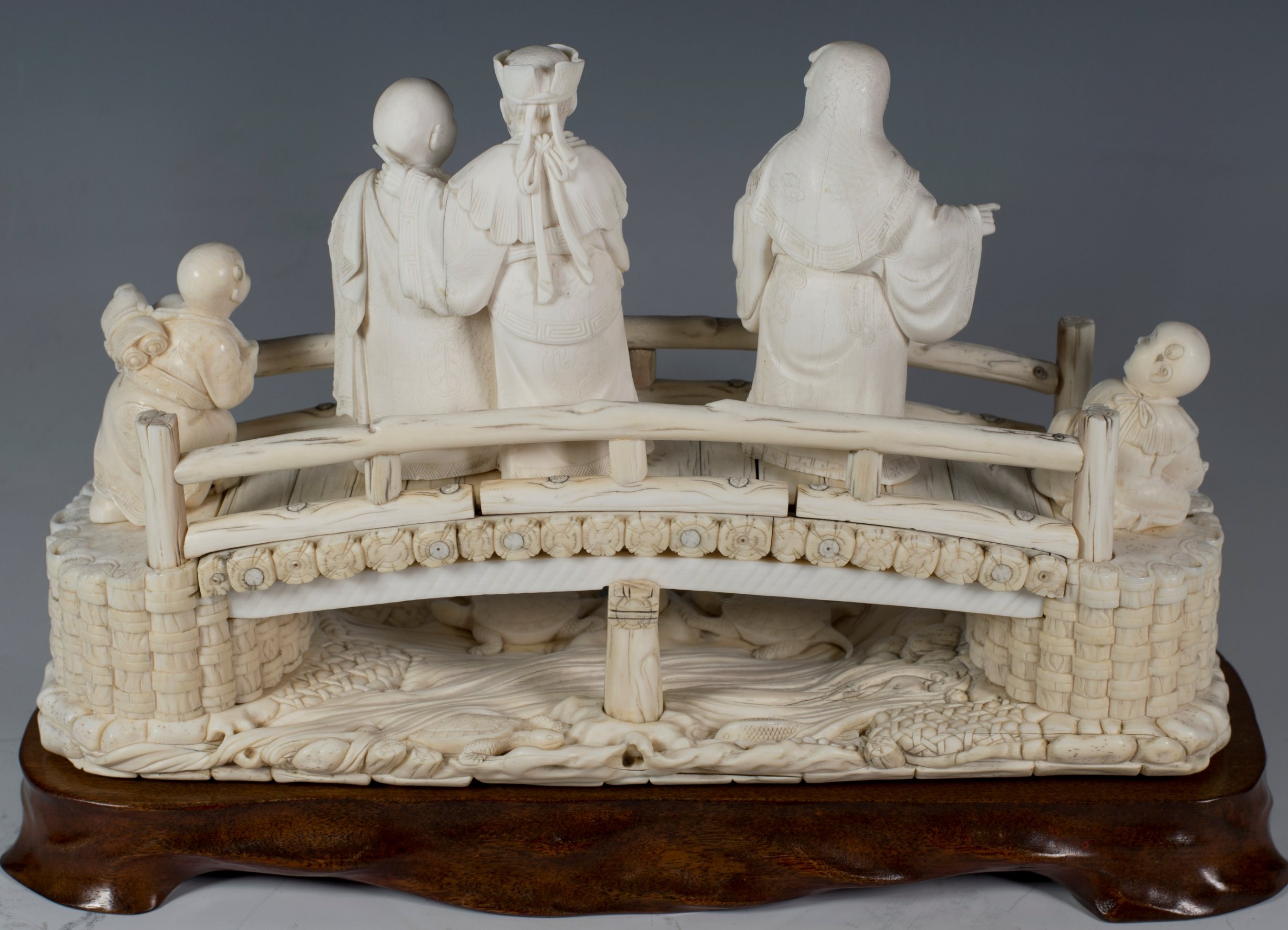 A LARGE JAPANESE IVORY OKIMONO BRIDGE GROUP - SIGNED TAKAAKI View X