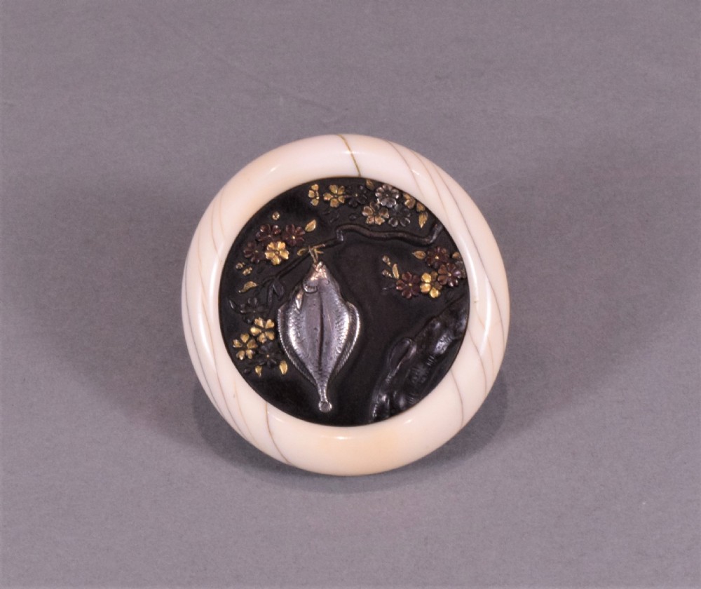 A JAPANESE EDO PERIOD IVORY & MIXED METAL KAGAMIBUTA NETSUKE - SILVER FLAT FISH View II