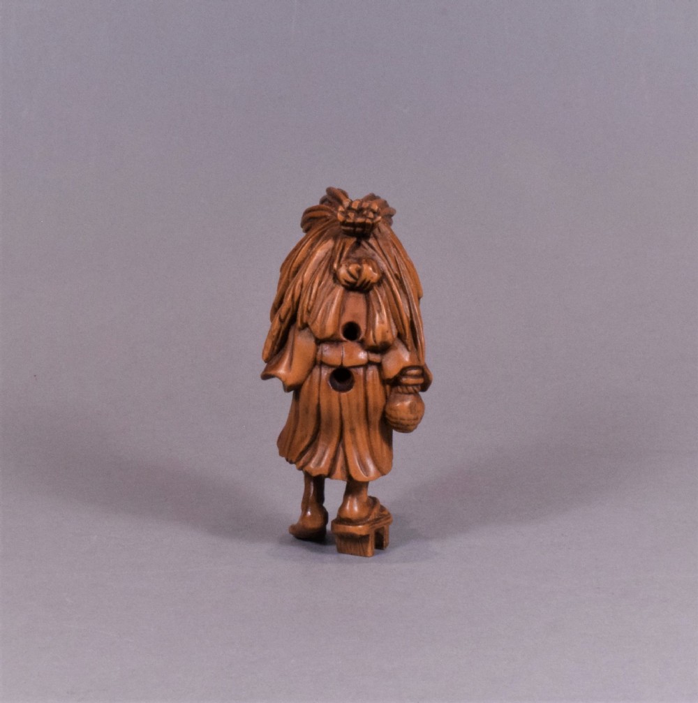 A WELL CARVED JAPANESE CARVED WOODEN NETSUKE - ABURA BOZU - THE OIL THIEF View IV