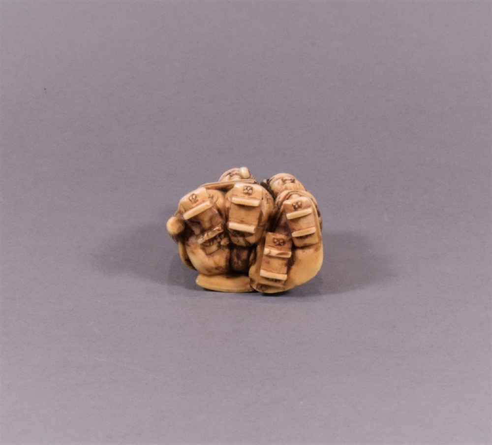 JAPANESE MEIJI PERIOD CARVED IVORY NETSUKE - TADAMORI AND THE OIL THIEF View V