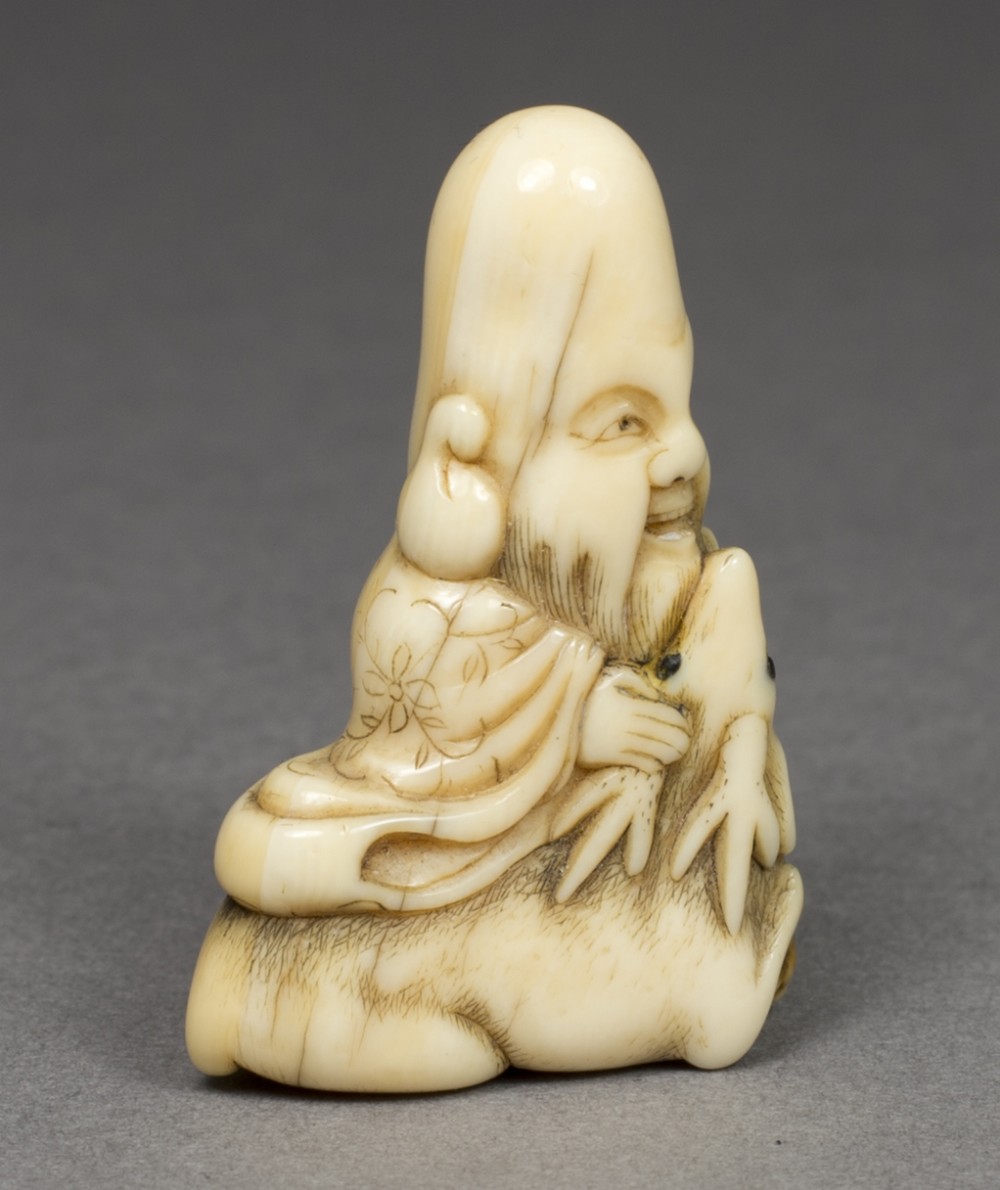 DELIGHTFUL JAPANESE EDO PERIOD IVORY NETSUKE OF FUKUROKUJU AND DEER - LUCKY GOD OF LONGEVITY View II