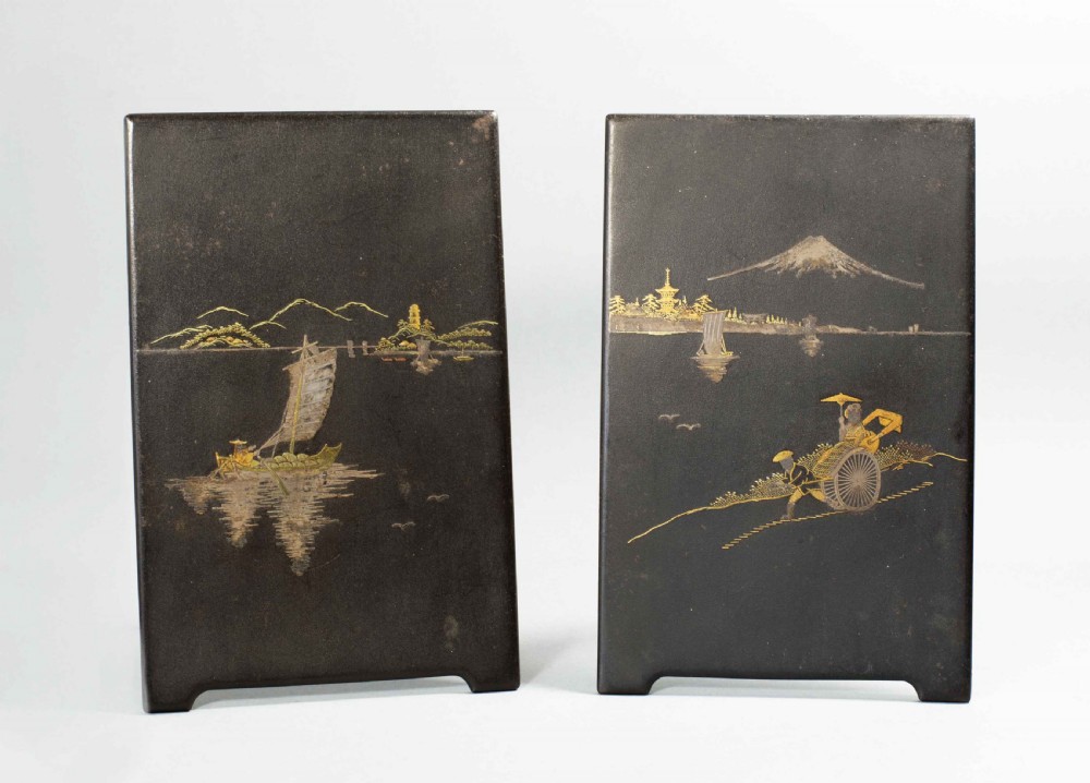 PAIR OF JAPANESE MEIJI PERIOD KOMAI STYLE IRON PLAQUES