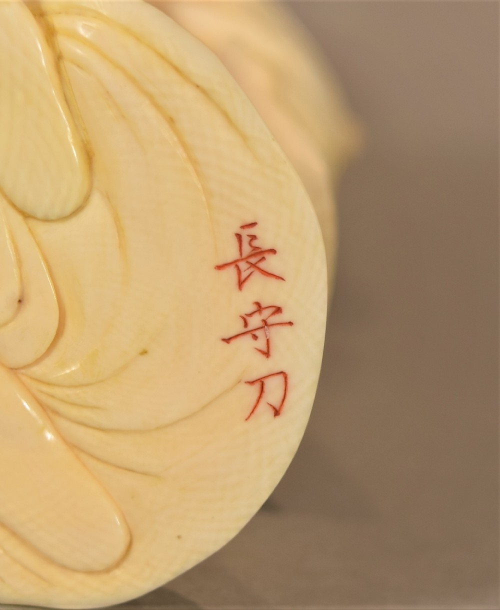 FINE QUALITY JAPANESE IVORY OKIMONO OF KANNON BODHISATTVA - SIGNED View X
