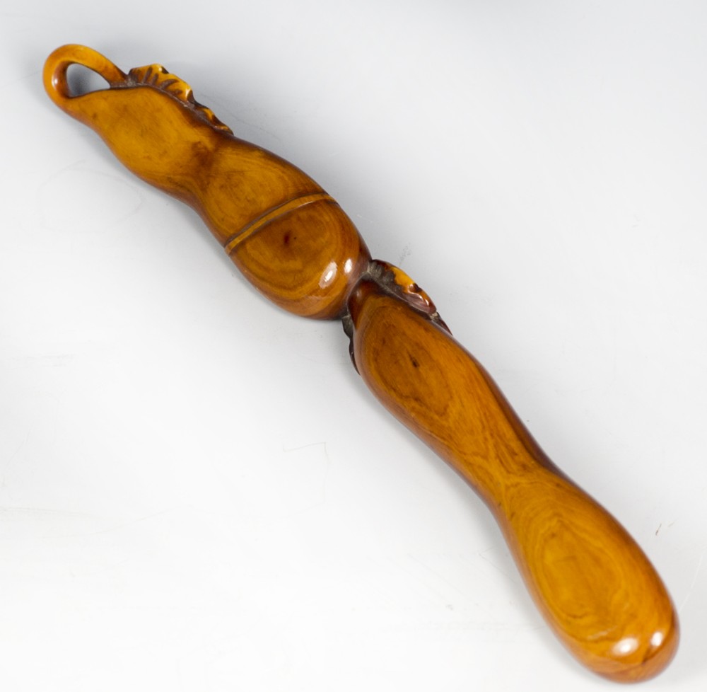 LARGE JAPANESE EDO PERIOD STAINED IVORY SASH NETSUKE View IV