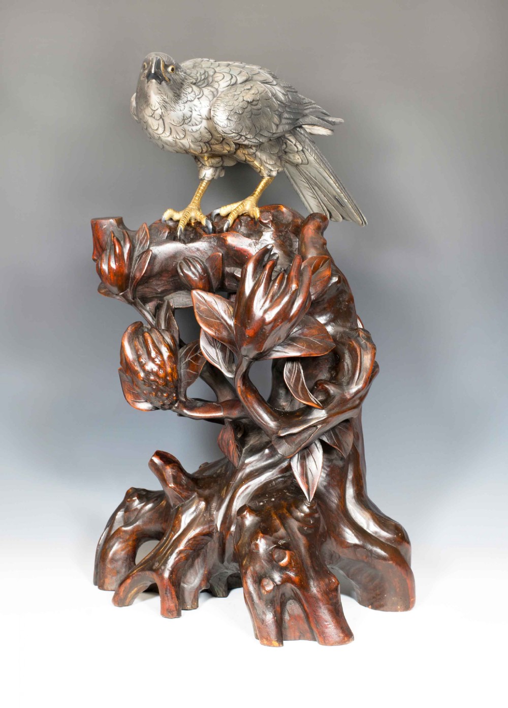 JAPANESE SILVERED BRONZE GOSS HAWK ON ROOTWOOD STAND BY KUNICHIKA