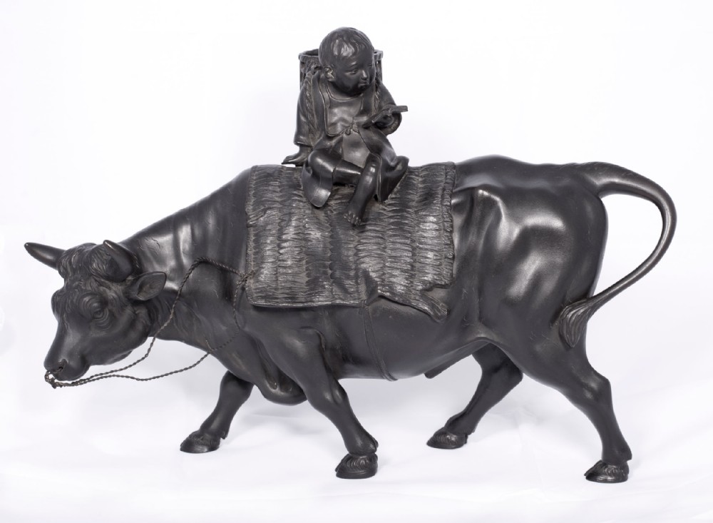 LARGE JAPANESE BRONZE OKIMONO OF A BOY SEATED UPON AN OXEN View VIII