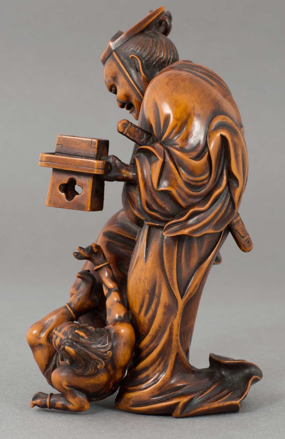 JAPANESE MEIJI PERIOD BOXWOOD OKIMONO DEPICTING SETSUBUN FESTIVAL AND ONI - SIGNED View VI