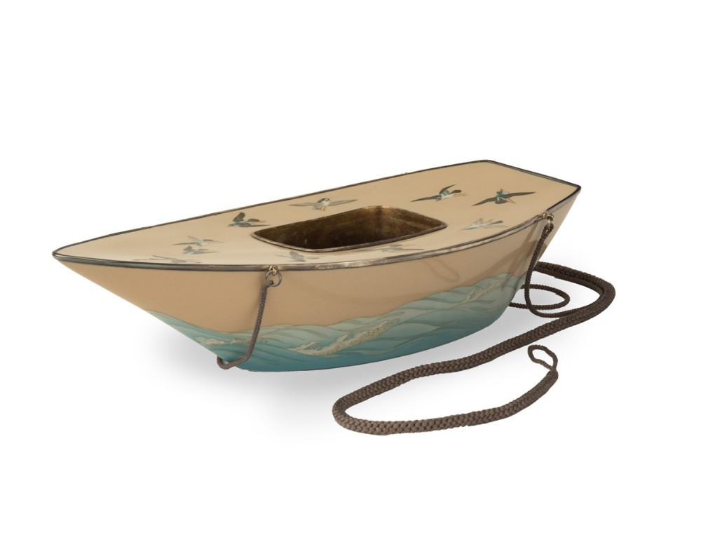 A boat-shaped Japanese cloisonne enamel hanging incense burner featuring flying bird motifs against a cream backdrop with wave details along the base, suspended by braided cords. View VI