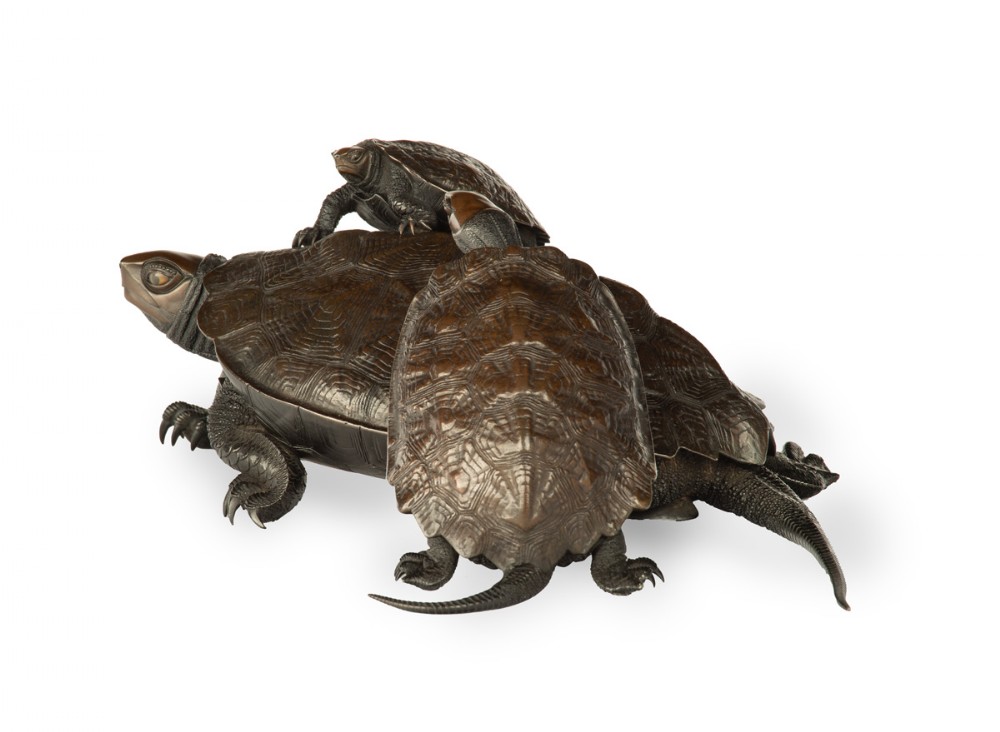 A Japanese bronze sculpture depicting a large turtle with two smaller turtles crawling on its shell. View VI