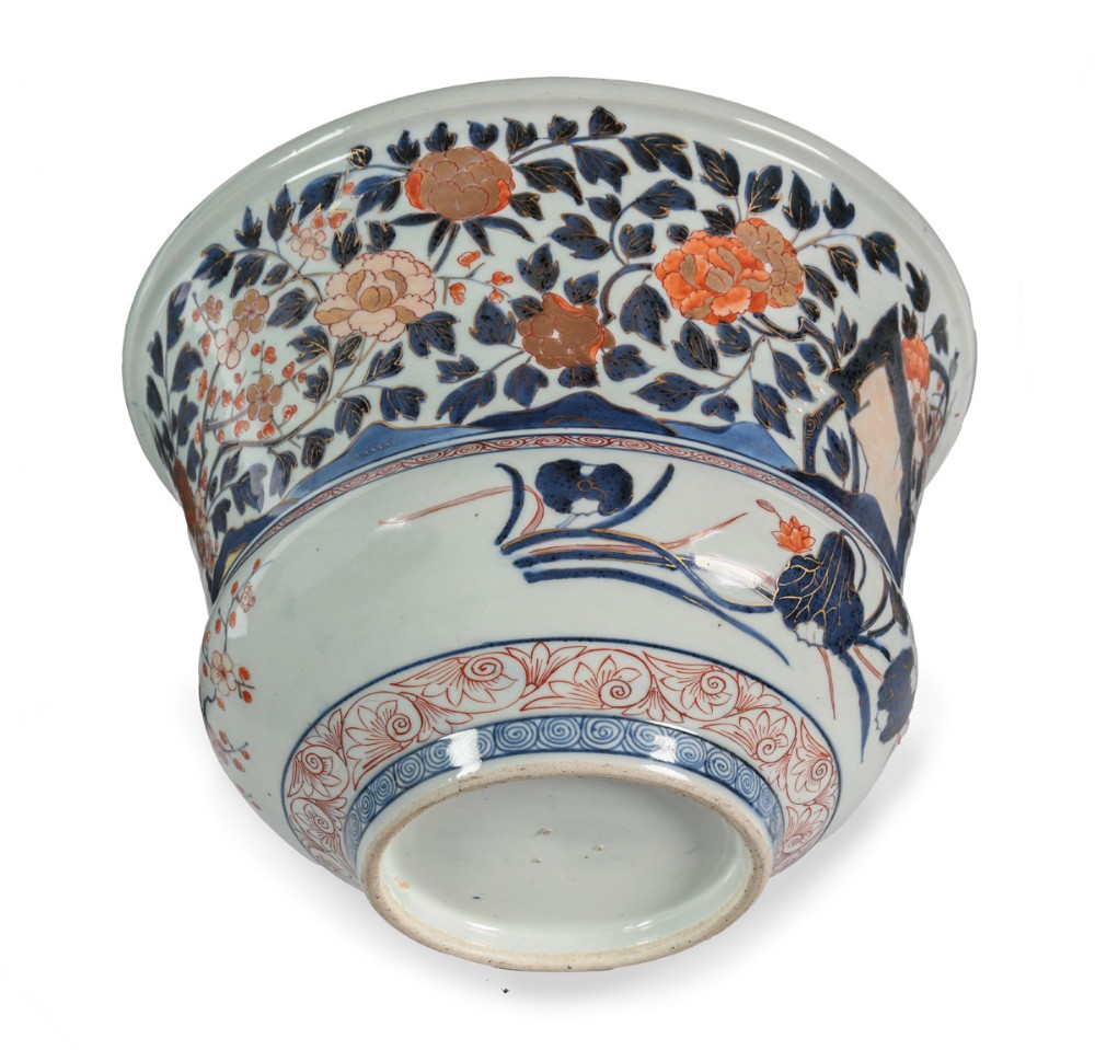 An 18th-century Japanese Arita Imari porcelain jardiniere decorated with cobalt blue foliage, rust red peonies, and an everted rim. View VI