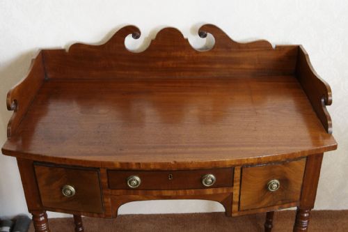 BOWFRONT SIDE TABLE WITH THREE DRAWERS - ADDITIONAL PHOTO 1