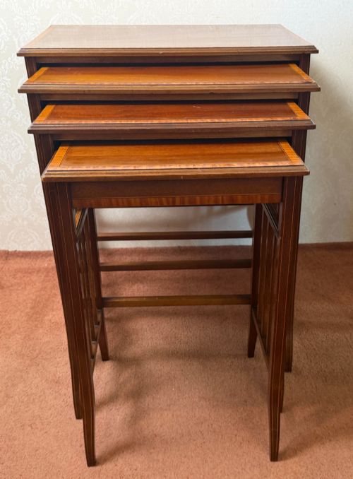 A Rare Set of Four Nesting Tables with Satinwood Cross Banding, Square Tapered Legs.