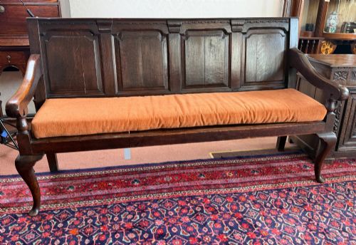 A Magnificent 18th Century Oak Pub Settle with Original Board Seat.