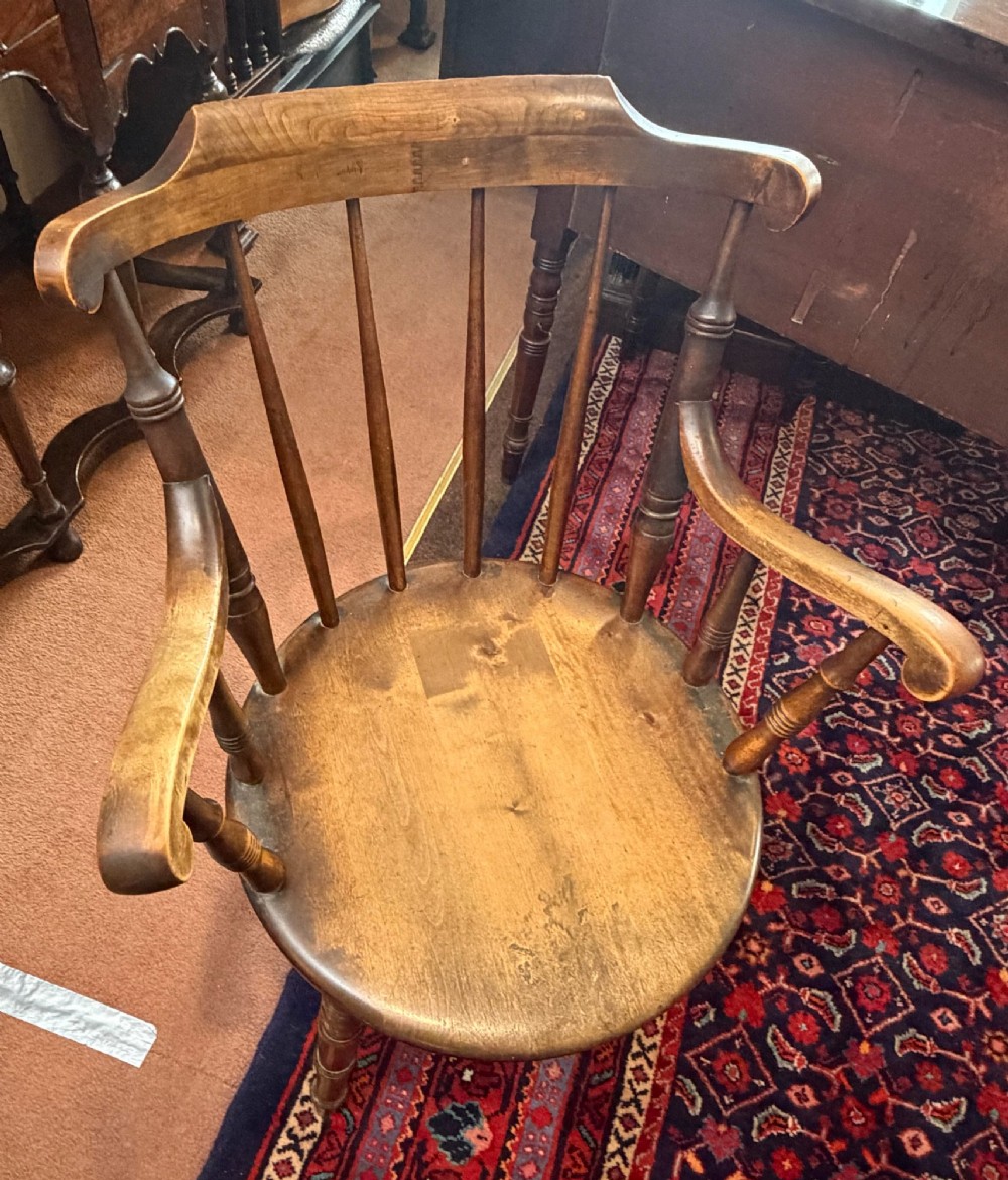 A Victorian ash wooden desk chair featuring turned legs, a contoured seat, curved armrests, and a spindle backrest. View III