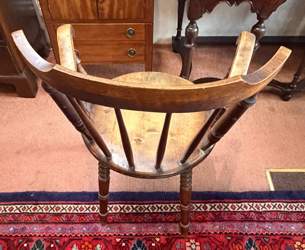 A Victorian ash wooden desk chair featuring turned legs, a contoured seat, curved armrests, and a spindle backrest. View IV