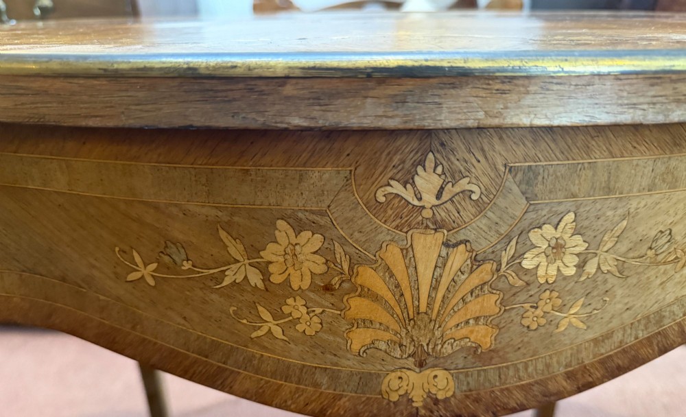 A Louis XV style walnut and kingswood side table featuring floral marquetry inlay, cabriole legs, and gilded brass mounts. View VIII