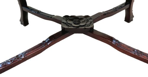 fig 3. A 19th-century rectangular dark hardwood low table with an inset marble panel top, deeply carved floral apron, and cabriole legs.