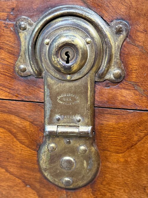 fig 2. A large nineteenth-century camphor wood campaign trunk featuring brass corner mounts, heavy latches, and exposed dovetail joints.