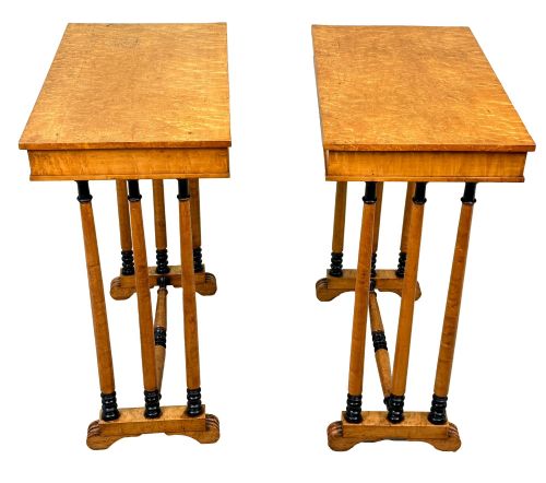 fig 2. A pair of Regency birdseye maple occasional tables featuring quadrupled slender turned legs with ebonised details and a stretcher base.