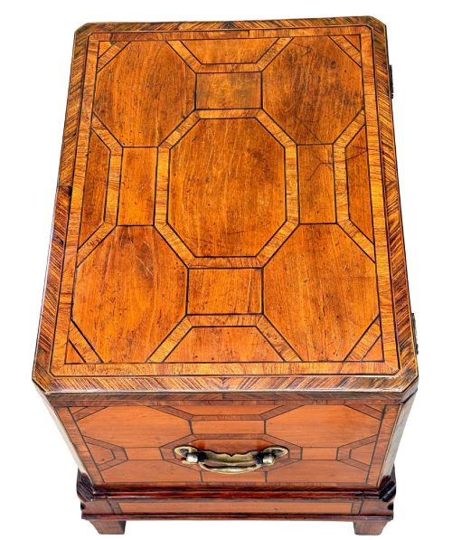fig 1. An 18th-century George II satinwood and kingwood parquetry box cellarette with brass carrying handles on square legs.