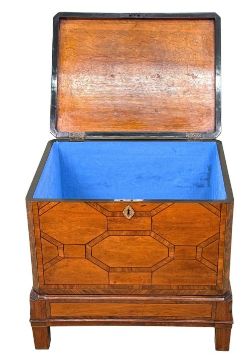 fig 3. An 18th-century George II satinwood and kingwood parquetry box cellarette with brass carrying handles on square legs.