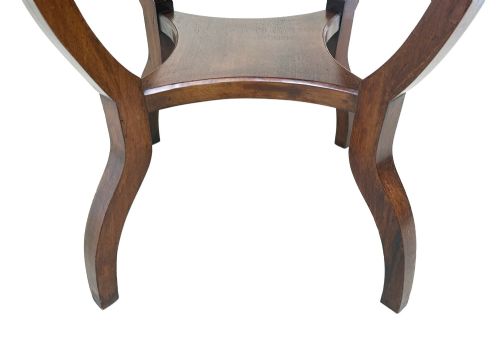 fig 5. A late nineteenth-century circular mahogany occasional table featuring a specimen marble top, outcurving legs with gilt mounts, and a lower undertier.