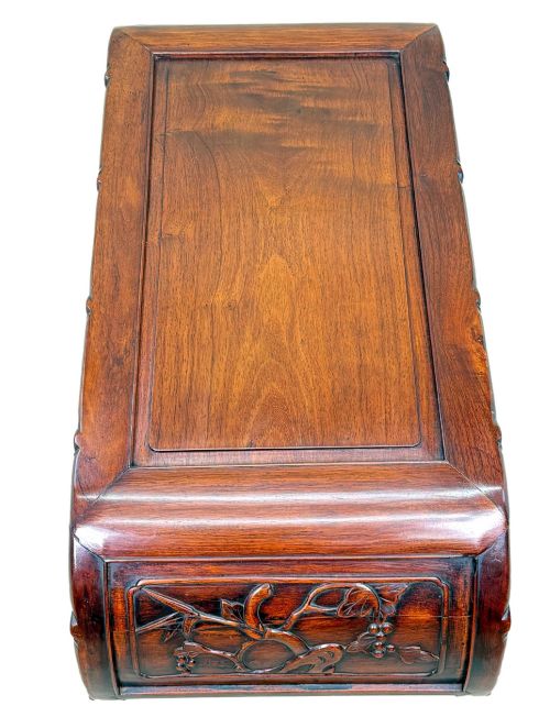 fig 2. A 19th-century dark hardwood Chinese export opium coffee table featuring scrolled legs and intricately carved pierced floral aprons.