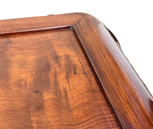 fig 4. A 19th-century dark hardwood Chinese export opium coffee table featuring scrolled legs and intricately carved pierced floral aprons.