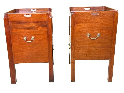 fig 3. A matched pair of Georgian mahogany bedside tables featuring top tray galleries with cutout handles, double cupboard doors, lower drawers, and brass hardware.
