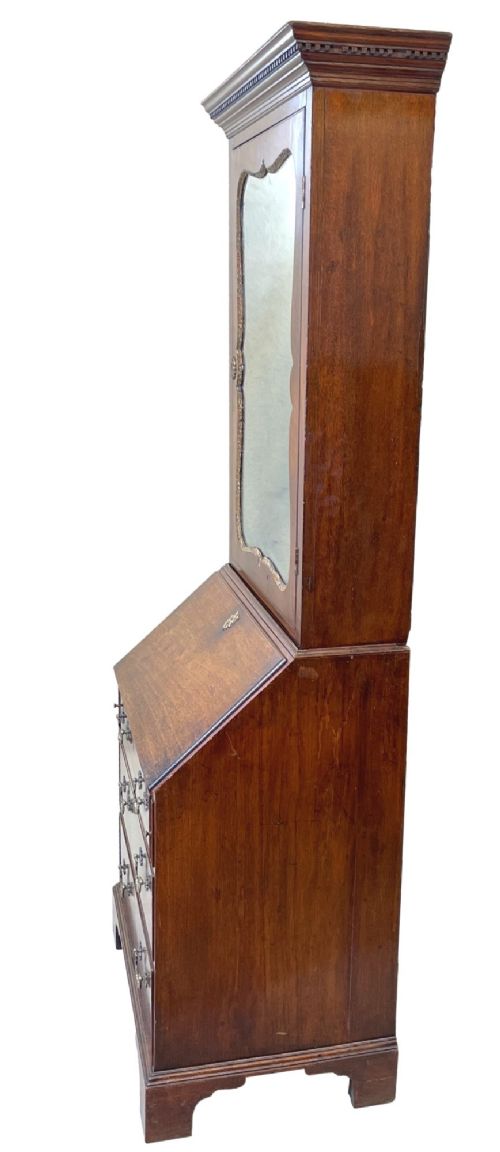 A Georgian mahogany bureau bookcase featuring an upper mirrored cabinet door above a slant-front desk and three lower drawers. View IV