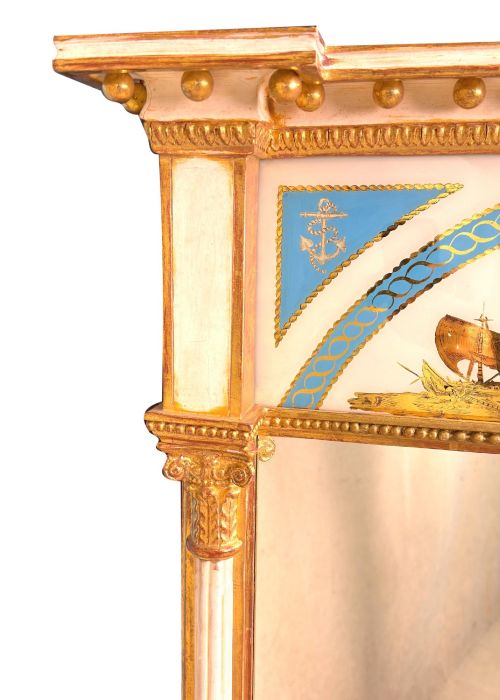 fig 1. A pair of tall early 19th-century Regency pier mirrors featuring gilded pilasters, breakfront cornices, and upper painted panels depicting maritime sailing vessels.