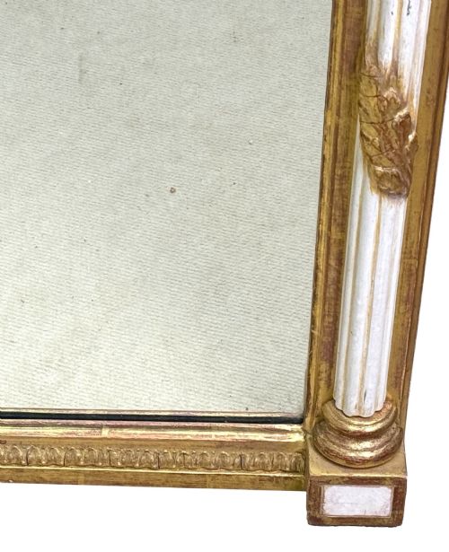 fig 4. A pair of tall early 19th-century Regency pier mirrors featuring gilded pilasters, breakfront cornices, and upper painted panels depicting maritime sailing vessels.