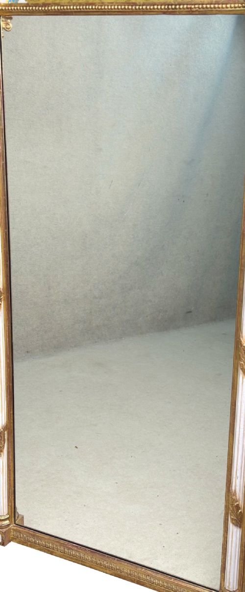 A pair of tall early 19th-century Regency pier mirrors featuring gilded pilasters, breakfront cornices, and upper painted panels depicting maritime sailing vessels. View X