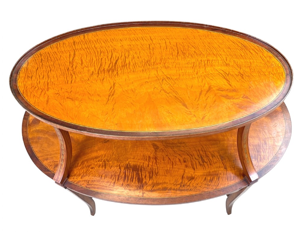 A 19th-century oval satinwood two-tier etagere table featuring geometric stringing inlay, a removable brass-handled upper tray, and outswept legs joined by an X-stretcher. View III