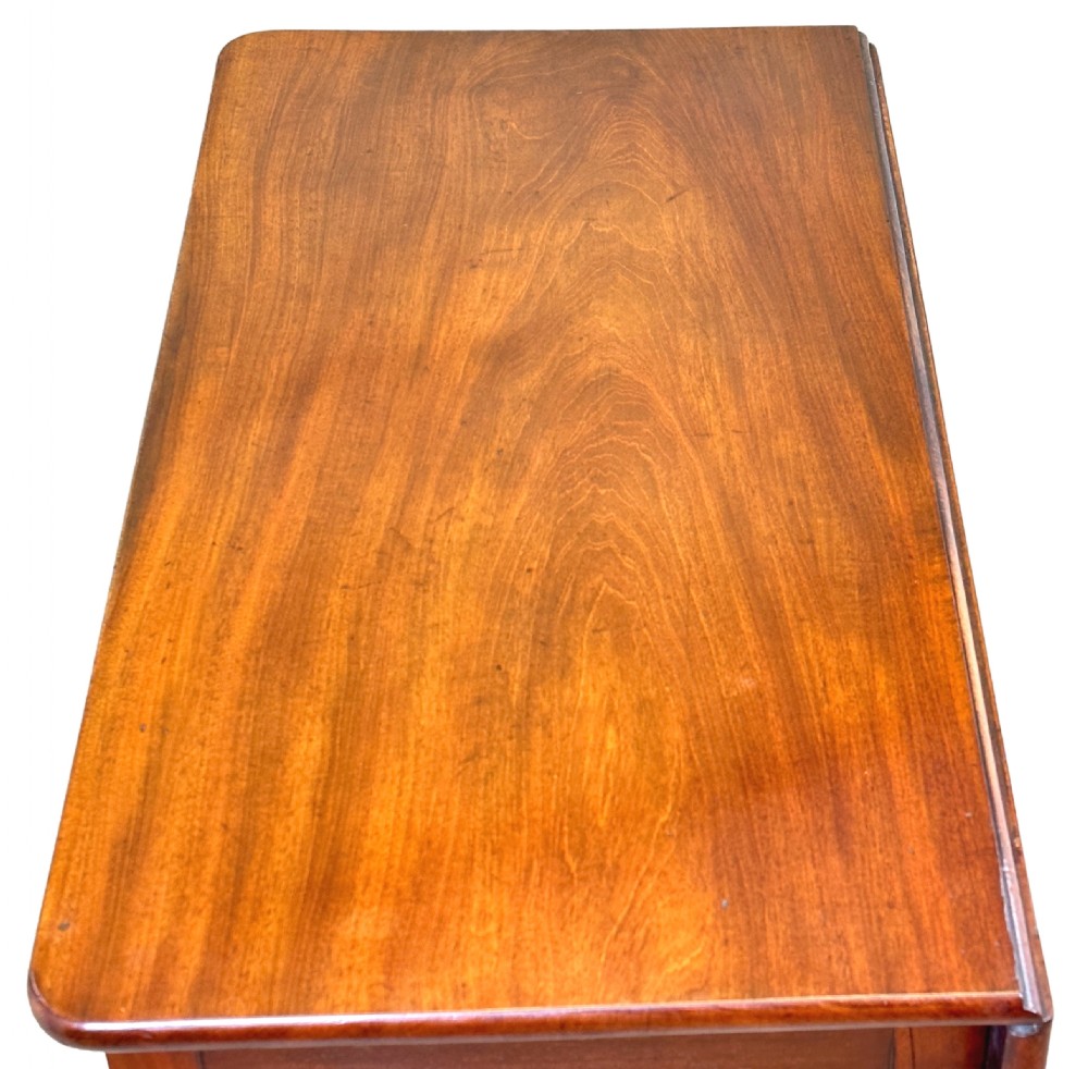 An 18th-century Georgian mahogany drop flap side table featuring a single drawer with a brass handle and carved square legs. View III