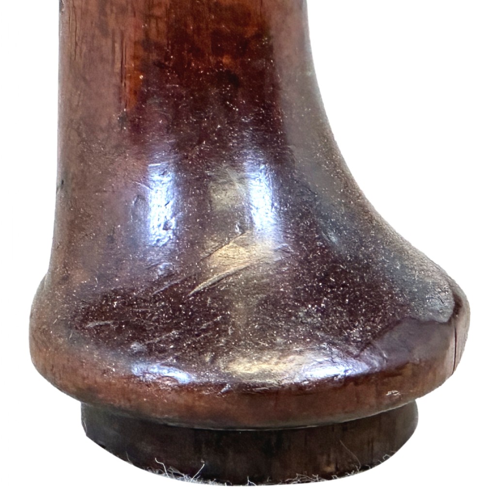 A Georgian dark mahogany drop-leaf dining table with an oval top and tapered legs featuring pad feet. View V