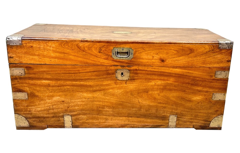A 19th-century rectangular camphor wood campaign trunk featuring brass corner brackets, flush side handles, and a brass keyhole escutcheon. View XII