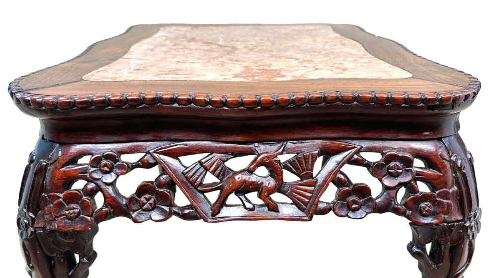 A 19th-century rectangular dark hardwood low table with an inset marble panel top, deeply carved floral apron, and cabriole legs. View III