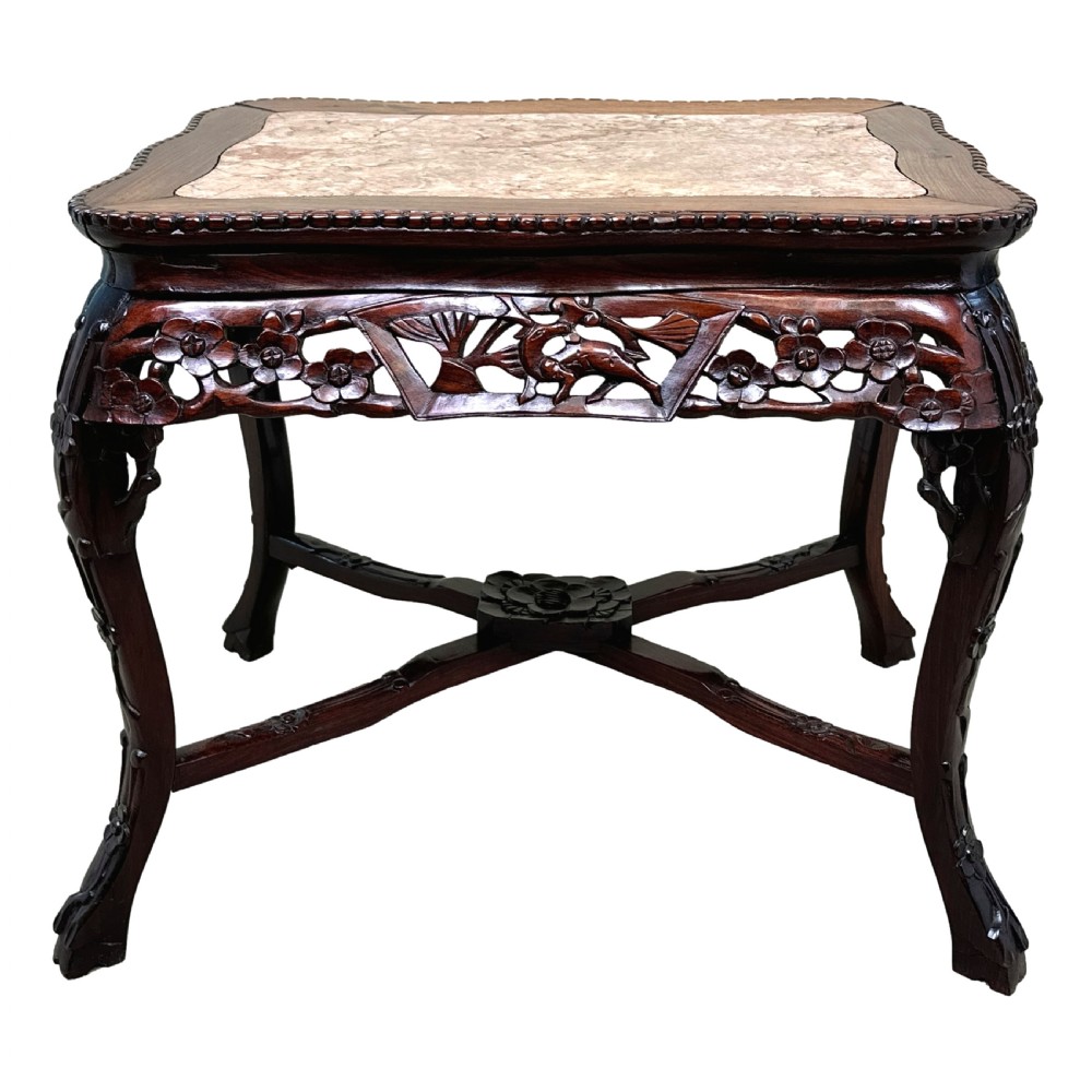 A 19th-century rectangular dark hardwood low table with an inset marble panel top, deeply carved floral apron, and cabriole legs. View V