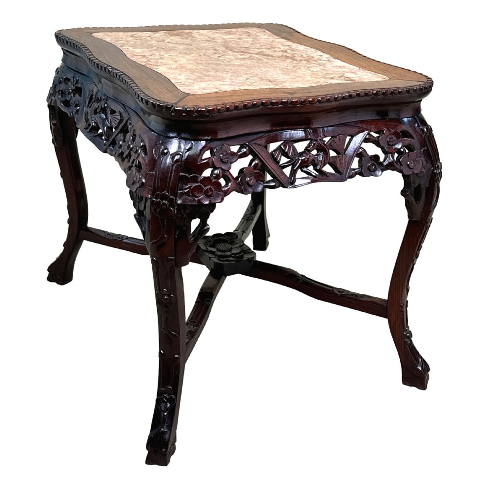 A 19th-century rectangular dark hardwood low table with an inset marble panel top, deeply carved floral apron, and cabriole legs. View VIII