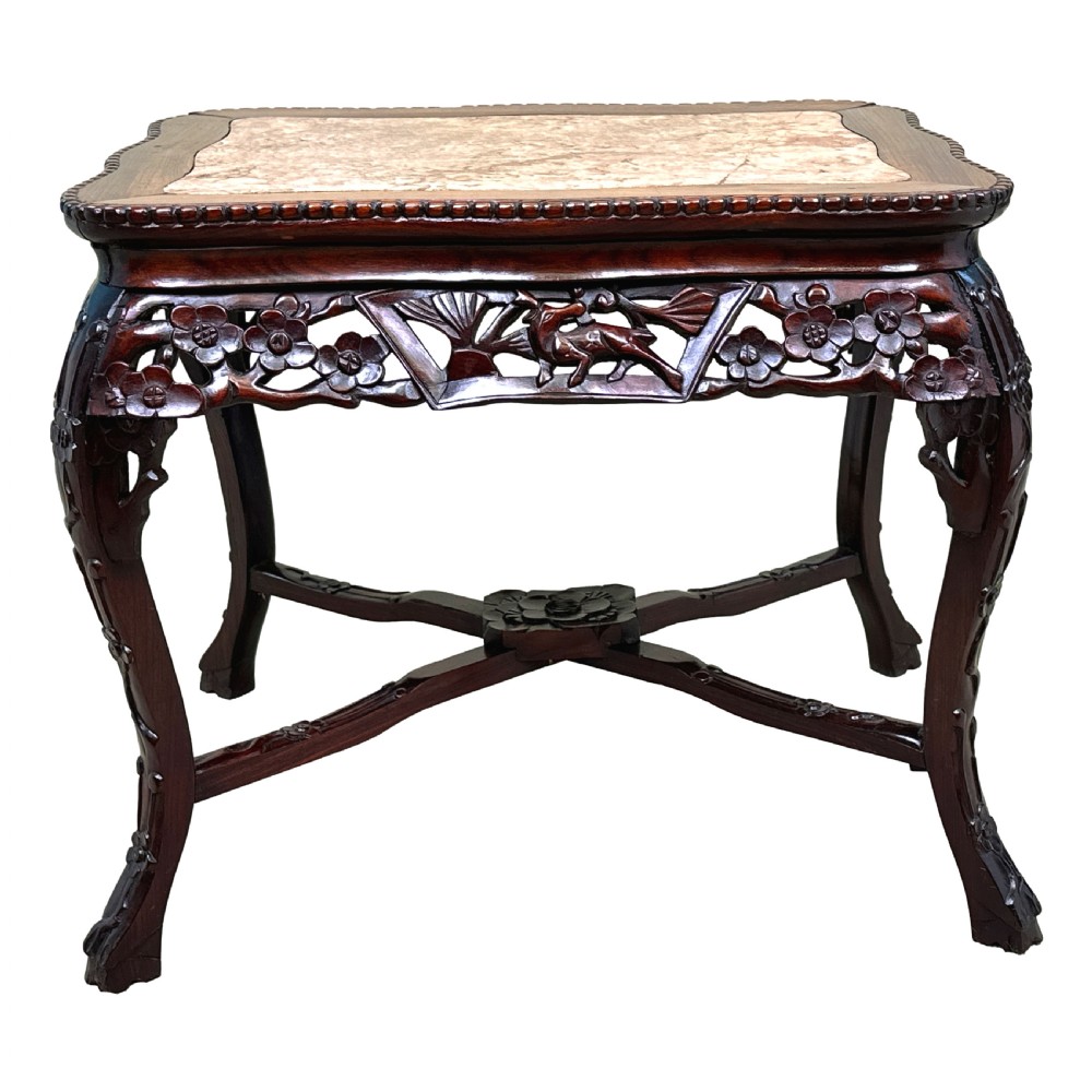 A 19th-century rectangular dark hardwood low table with an inset marble panel top, deeply carved floral apron, and cabriole legs. View XI