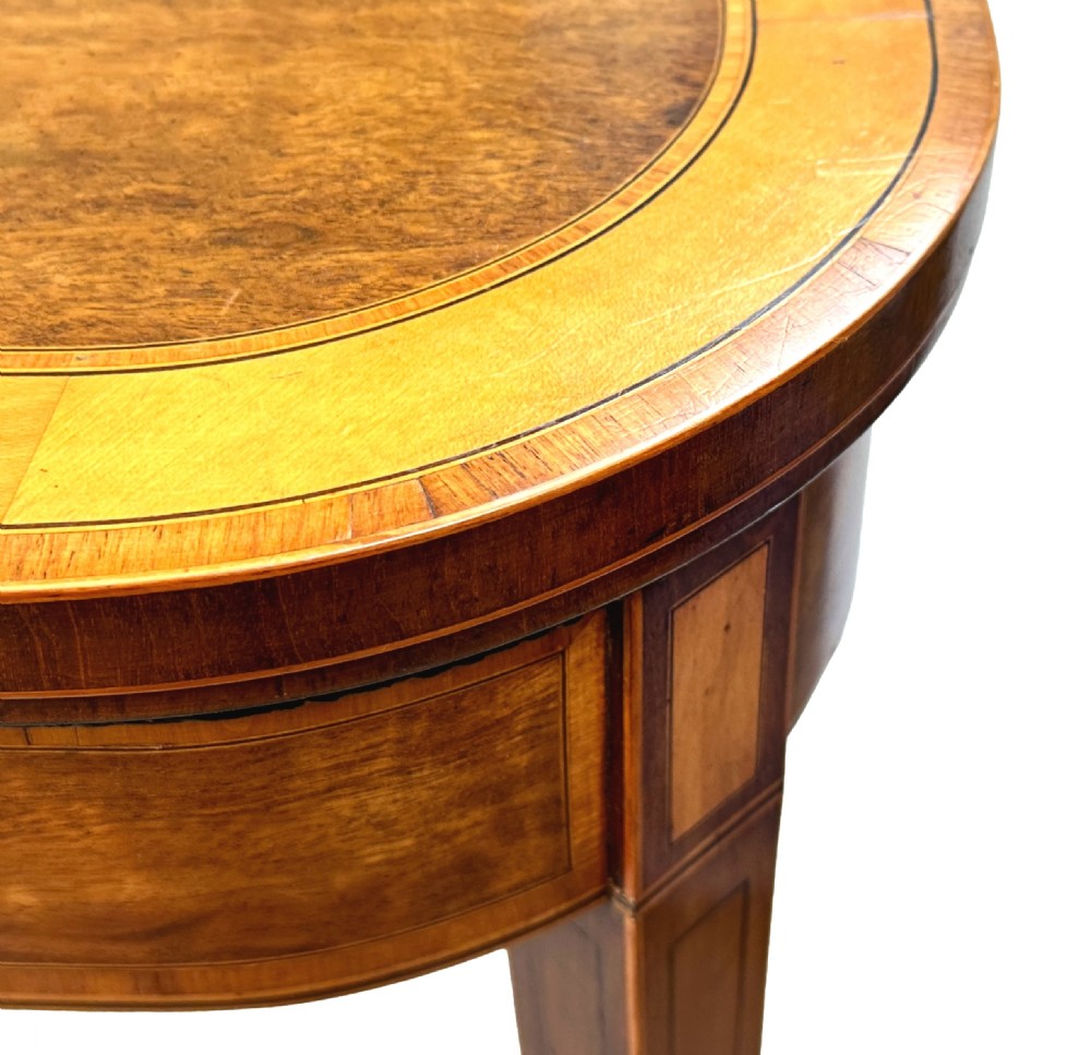 A pair of late Georgian mahogany fold-over card tables featuring satinwood crossbanding and square tapered legs. View VII